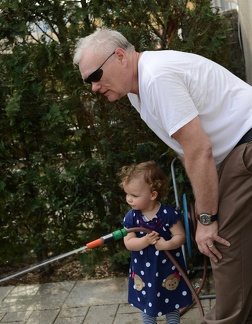 Playing with the hose and grandpa3